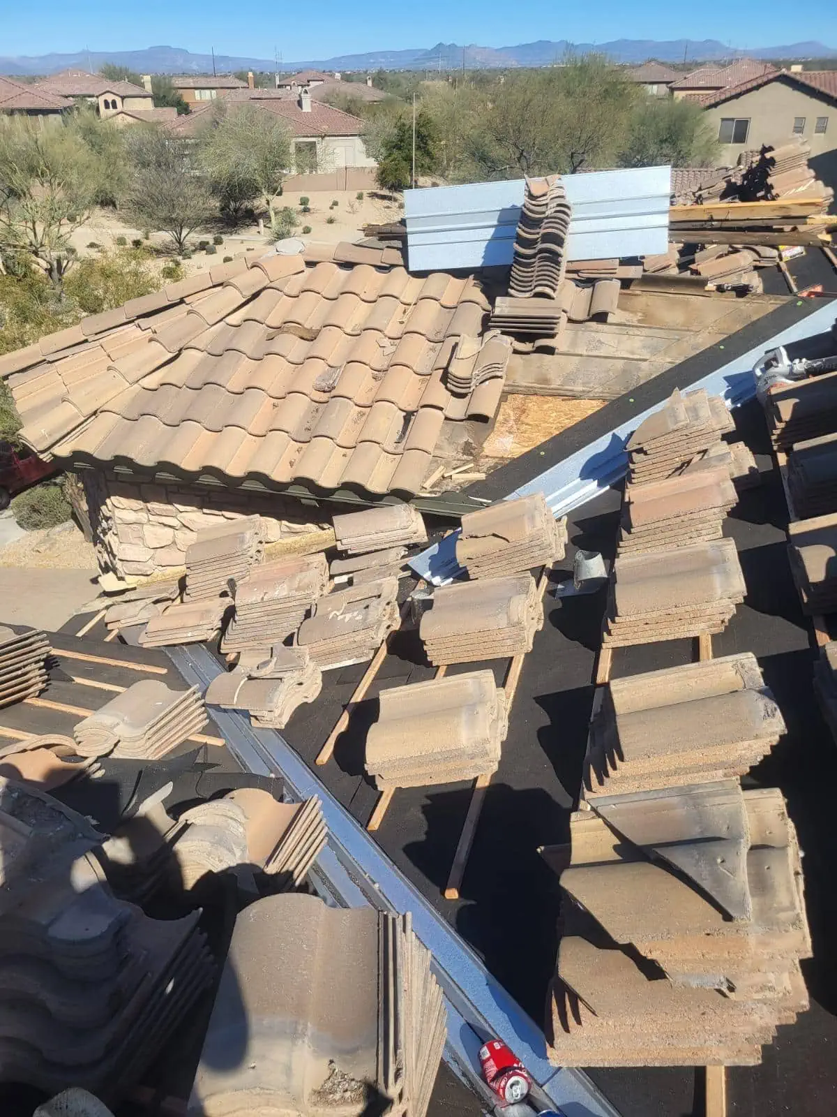 tile being repaired on roof in fountain hills
