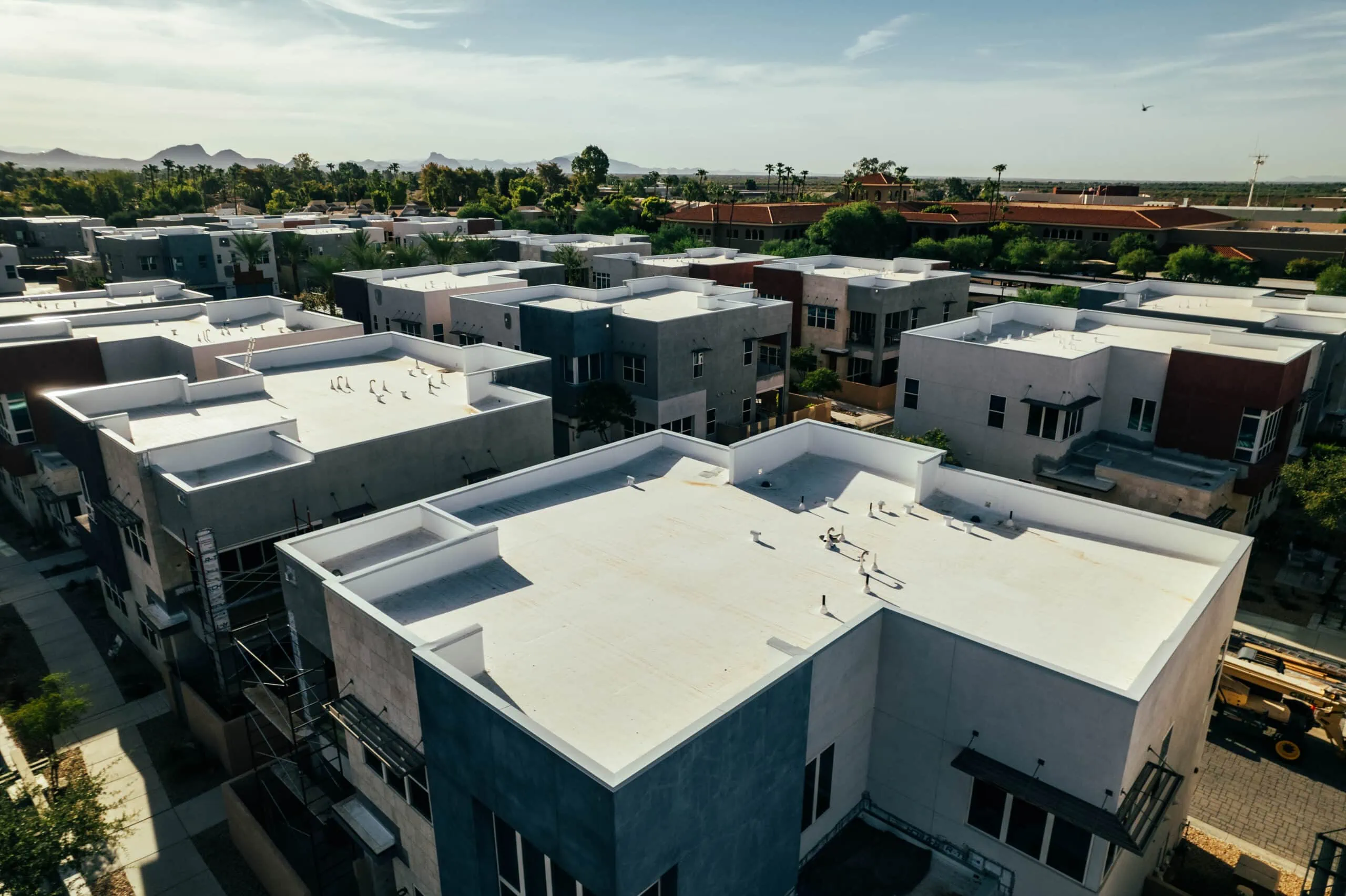 aerial view of a multi family building with a foam roof in scottsdale a popular choice for roofing companies