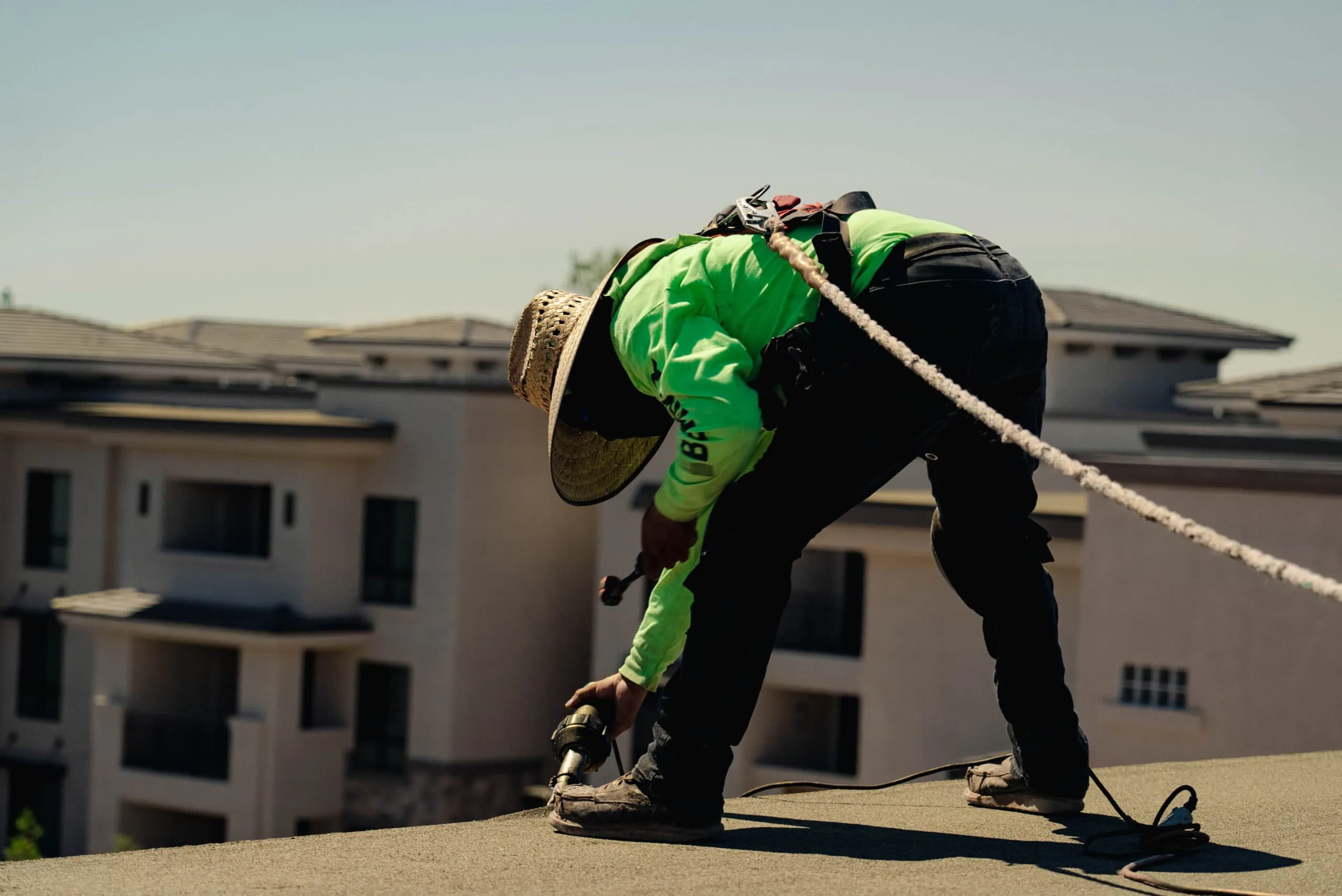 behmer employee on roof during concrete tile repair in phoenix