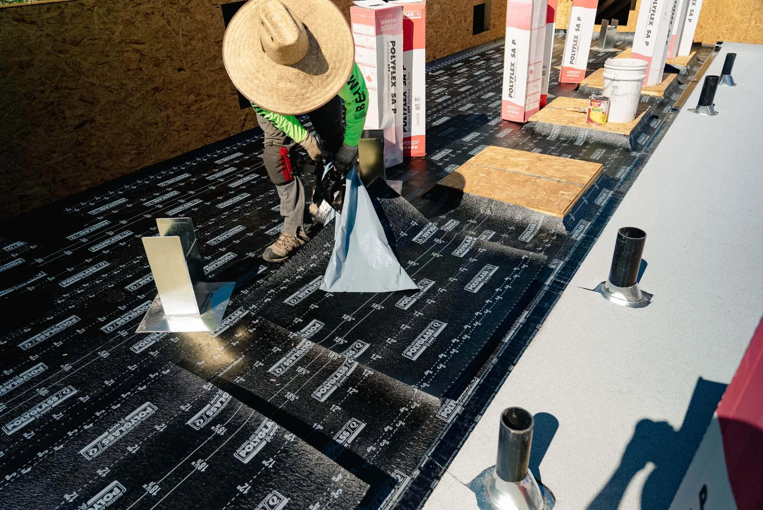 behmer roofer installing underlayment on commercial property in phoenix