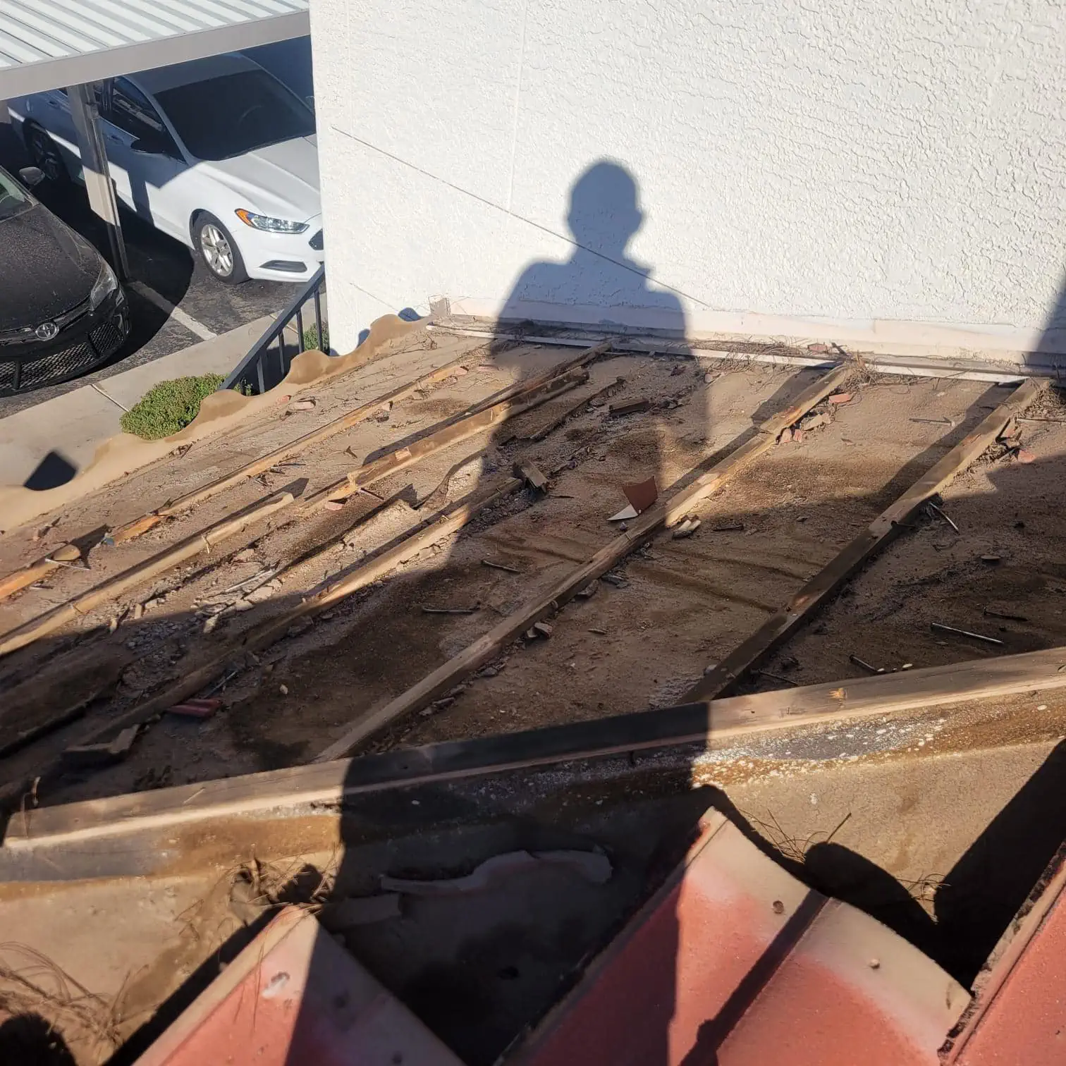 signs of damaged residential tile roof in carefree
